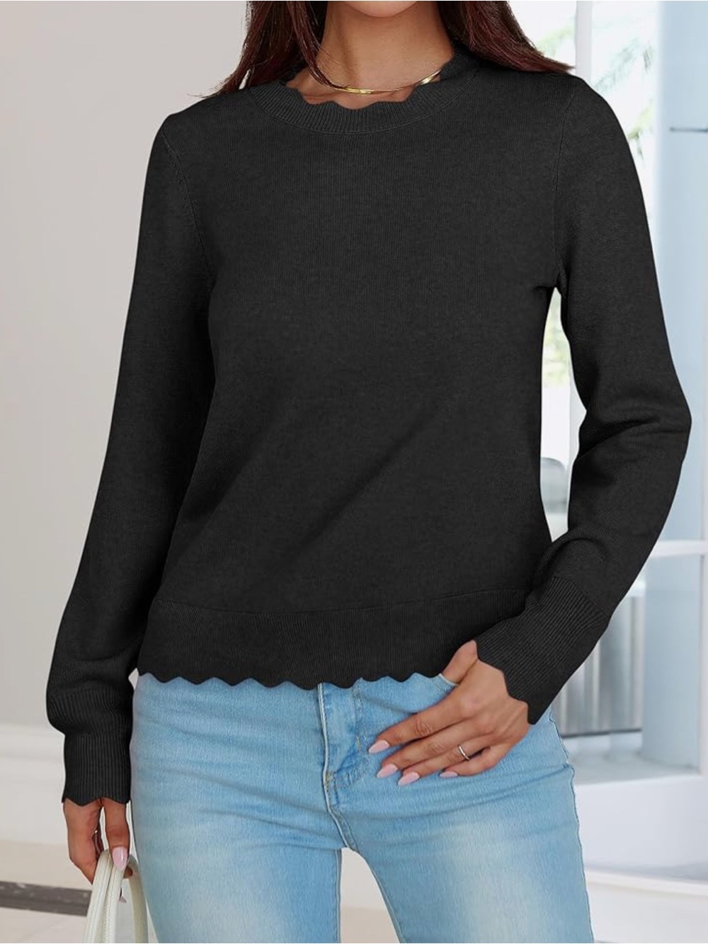 NWOT cute black scalloped sweater
Size L